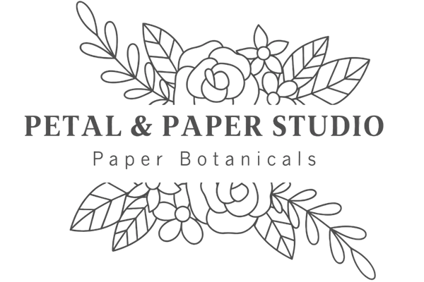 Logo for Petal & Paper Studio with floral and botanical design elements on a transparent background.